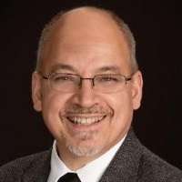John C. Comisi