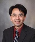 Zhiguo Zhang