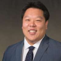 J. Andy Tau