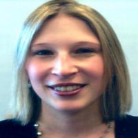 Tacy E. Downing