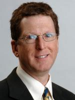 William E. Charash