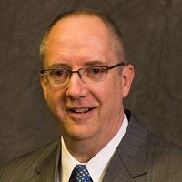 John G. Aker