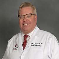 Mark P. Tallman