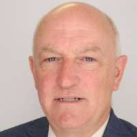 B. Mark Keegan
