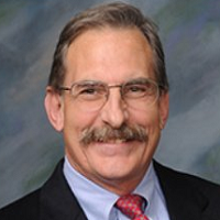 John E. Mitakides